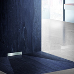 Innowacyjne odwadnianie powierzchni w łazience z odpływem ściennym Scada.