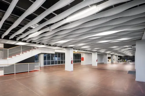 MINERAL Baffle Element Arc | Knauf Ceiling Solutions